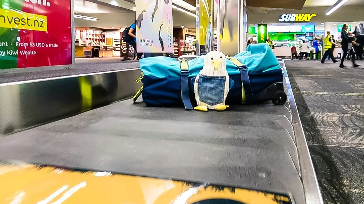 Bagage op de band op NZ vliegveld